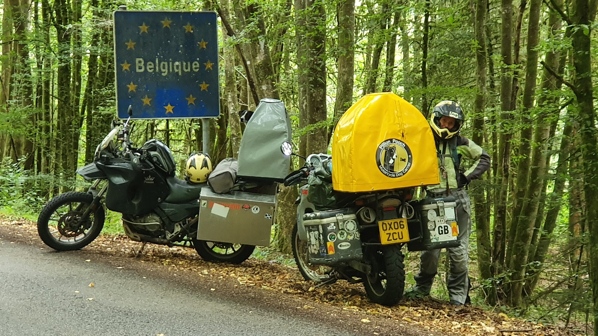 The Pack Track riding into Belgium. Mandatory photo of the Pillion Pooch's with the Belgium sign.